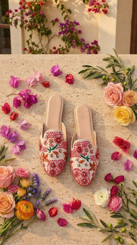 Pinkadoodle Ivory Pink Embroidered Mule Flat Pair – Top View Surrounded by Mixed Blooms by Radiarte