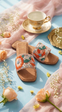 Phool Multicolour Floral Embroidered Slide Flat by Radiarte – Flat Lay on Sky Blue with Peach Roses & Teacup