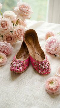 Jugnu Hot Pink Jutti Pair with White Flower Embroidery – Floral Backdrop by Radiarte