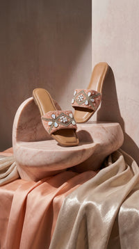 Peach Aura Beaded Slide Flat Pair – Side View on Curved Marble Pedestal by Radiarte