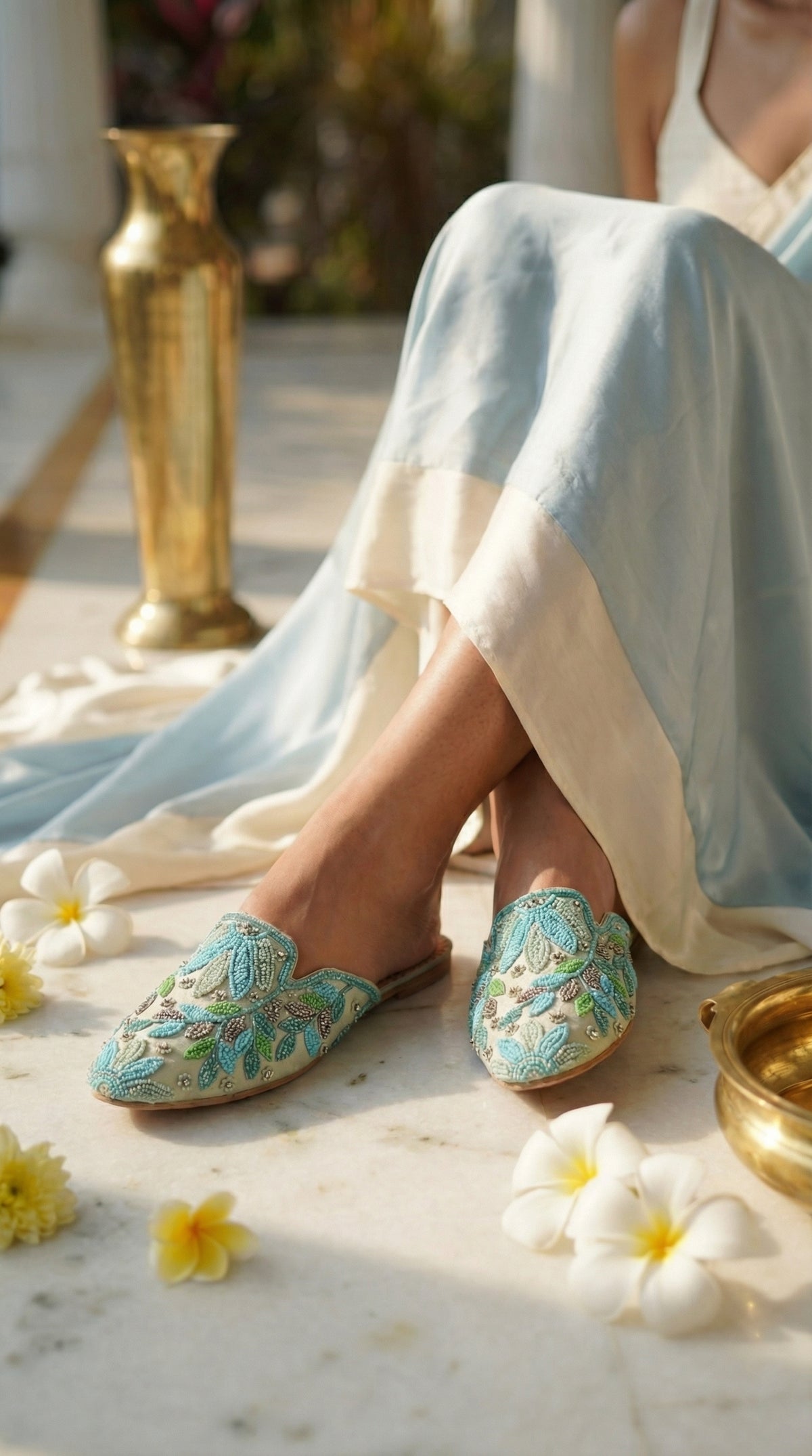 Whispering Skies beaded leaf mule flat on feet – worn with sky blue and ivory ethnic outfit with plumeria Radiarte