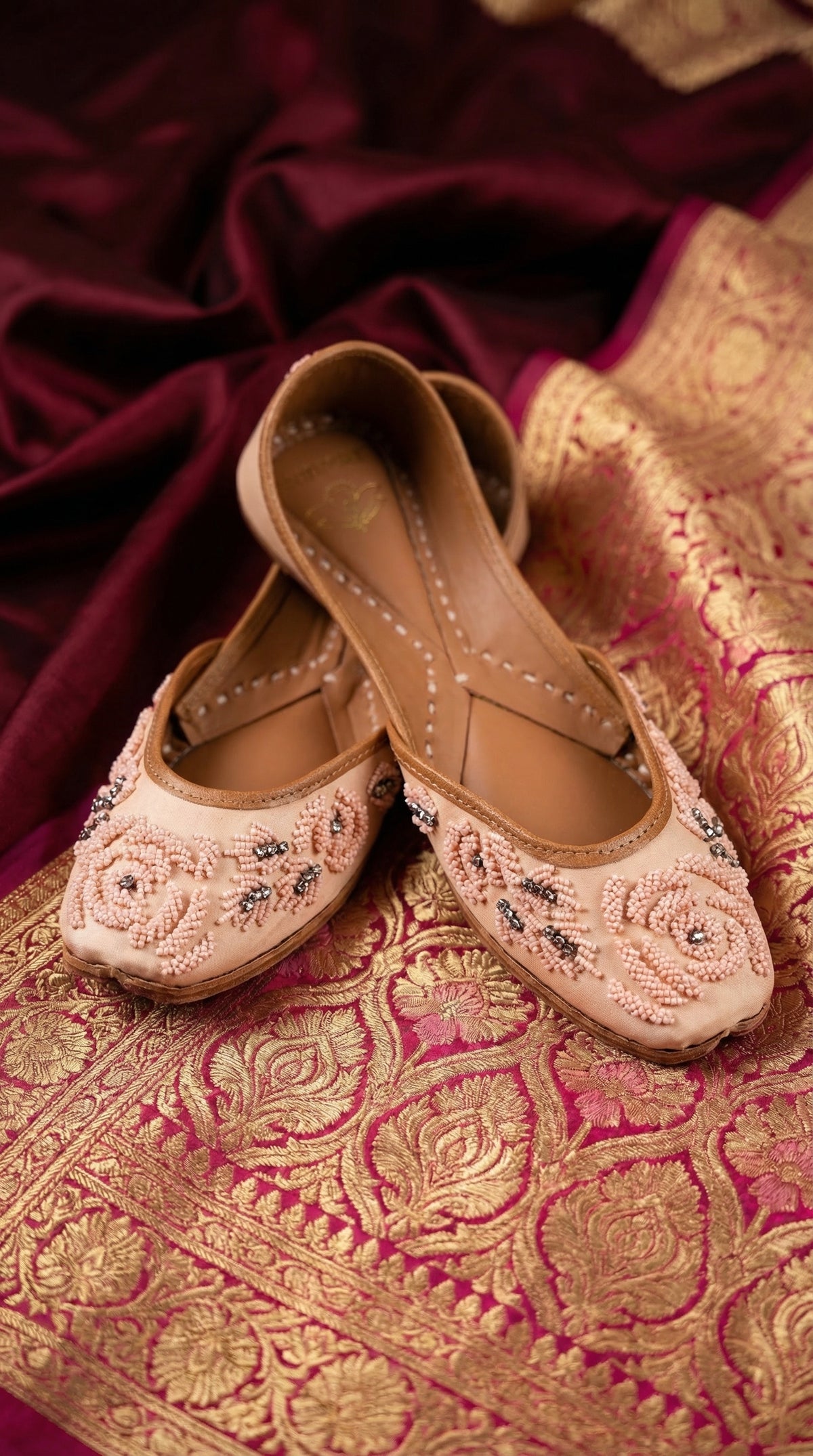 Gulroshan Handcrafted Pink Rose Bead Jutti – Side View on Banarasi Fabric