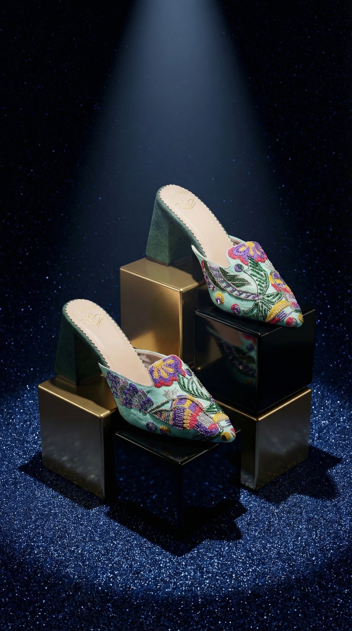 Rio mint green beaded mule heel pair – spotlight display on gold and black blocks by Radiarte