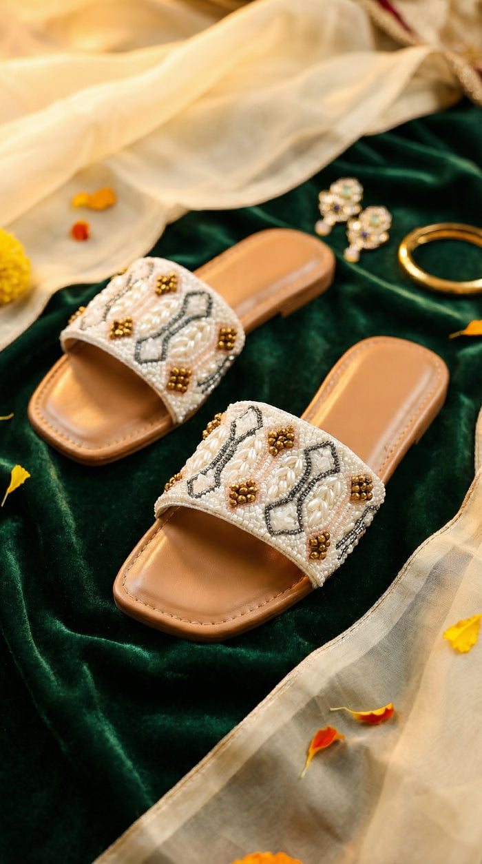 Taj handcrafted pearl and gold crystal slide flat pair – side view on green velvet with kundan earrings Radiarte