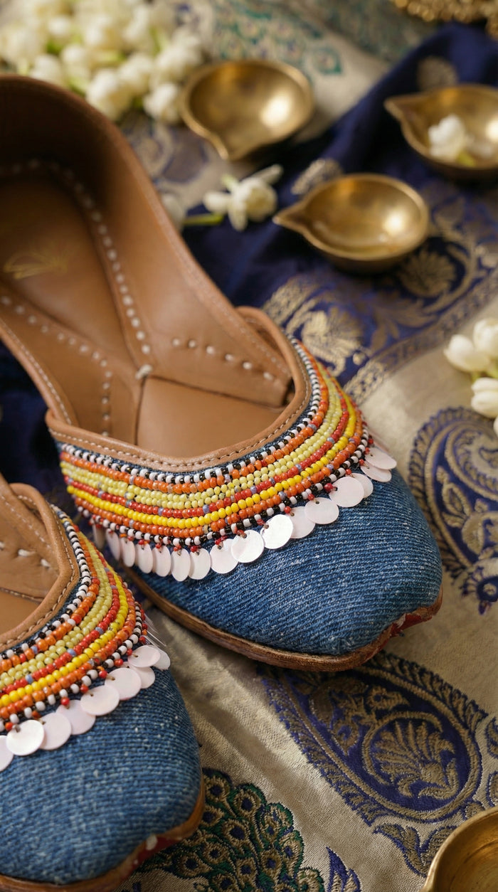 Zyra handcrafted multicolour bead stripe denim jutti – close-up of coin sequin fringe and rainbow bead work Radiarte