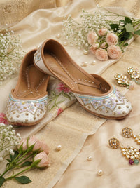 Noorani Ivory Iridescent Jutti Pair – Flat Lay with Pink Roses & Kundan Earrings by Radiarte