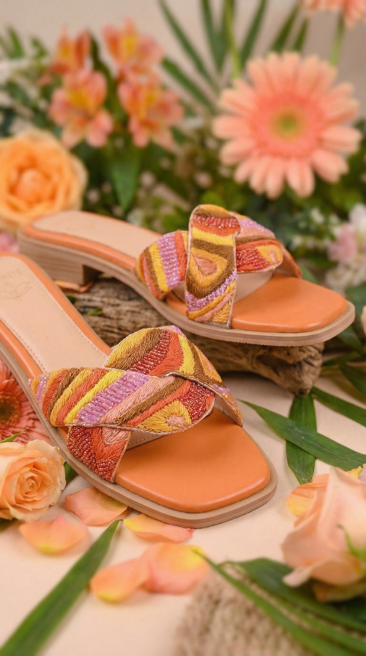 Gulnaar Orange Twisted Cross Strap Slide – Front View by Radiarte