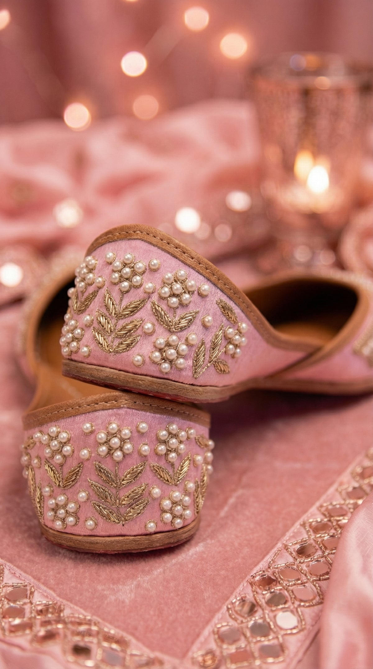 Nazakat Baby Pink Pearl Jutti Pair – back View with Candlelight & Pink Velvet by Radiarte
