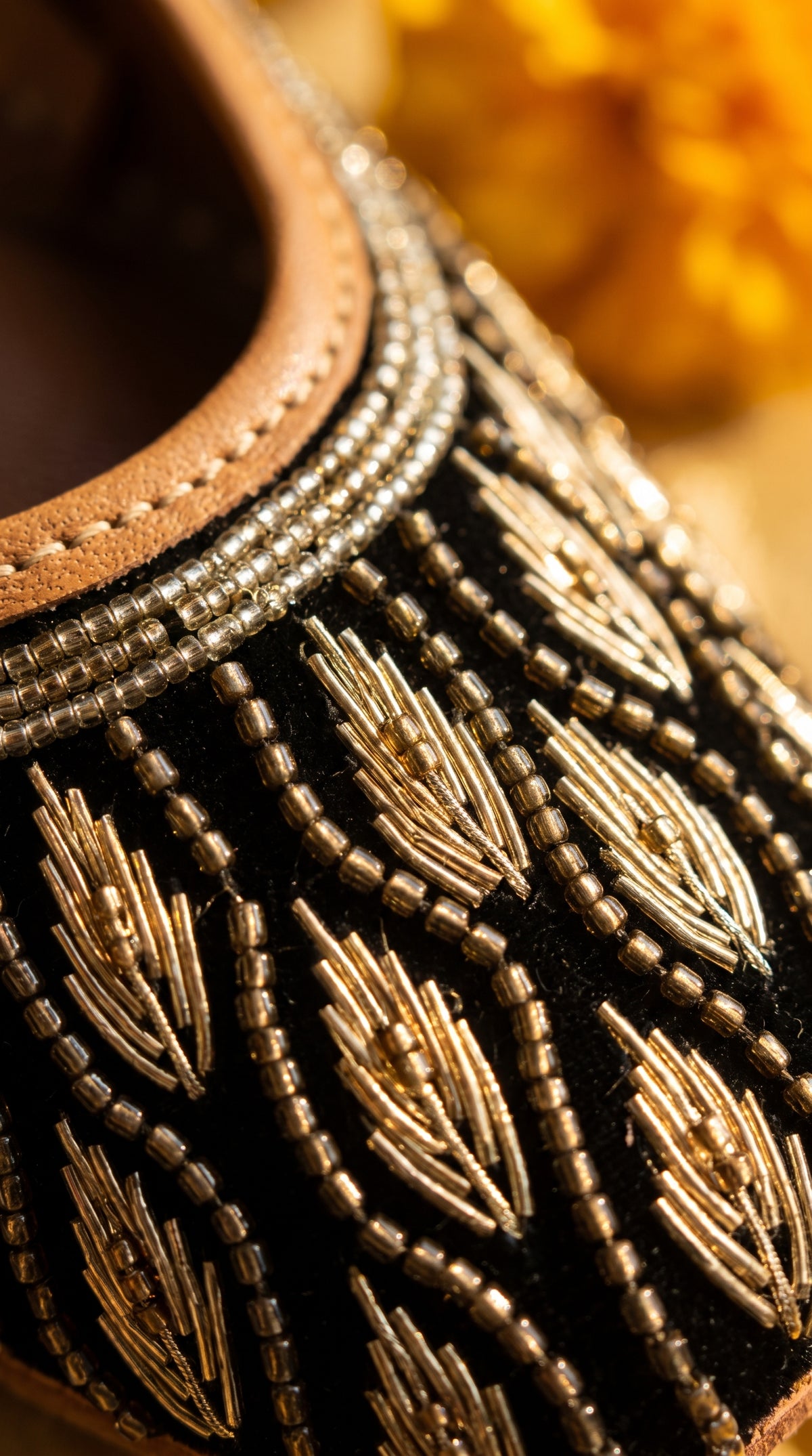 Shabnoor jutti close-up gold bead leaf embroidery detail