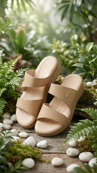 Dhara Beige PU Double Strap Slide – Side View with Tropical Plants by Radiarte