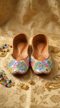 Meher White Multicolour Mirror Beaded Jutti by Radiarte – Front View with Gold Jewellery Flat Lay